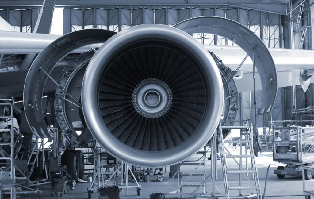 Opened aircraft engine in the hangar